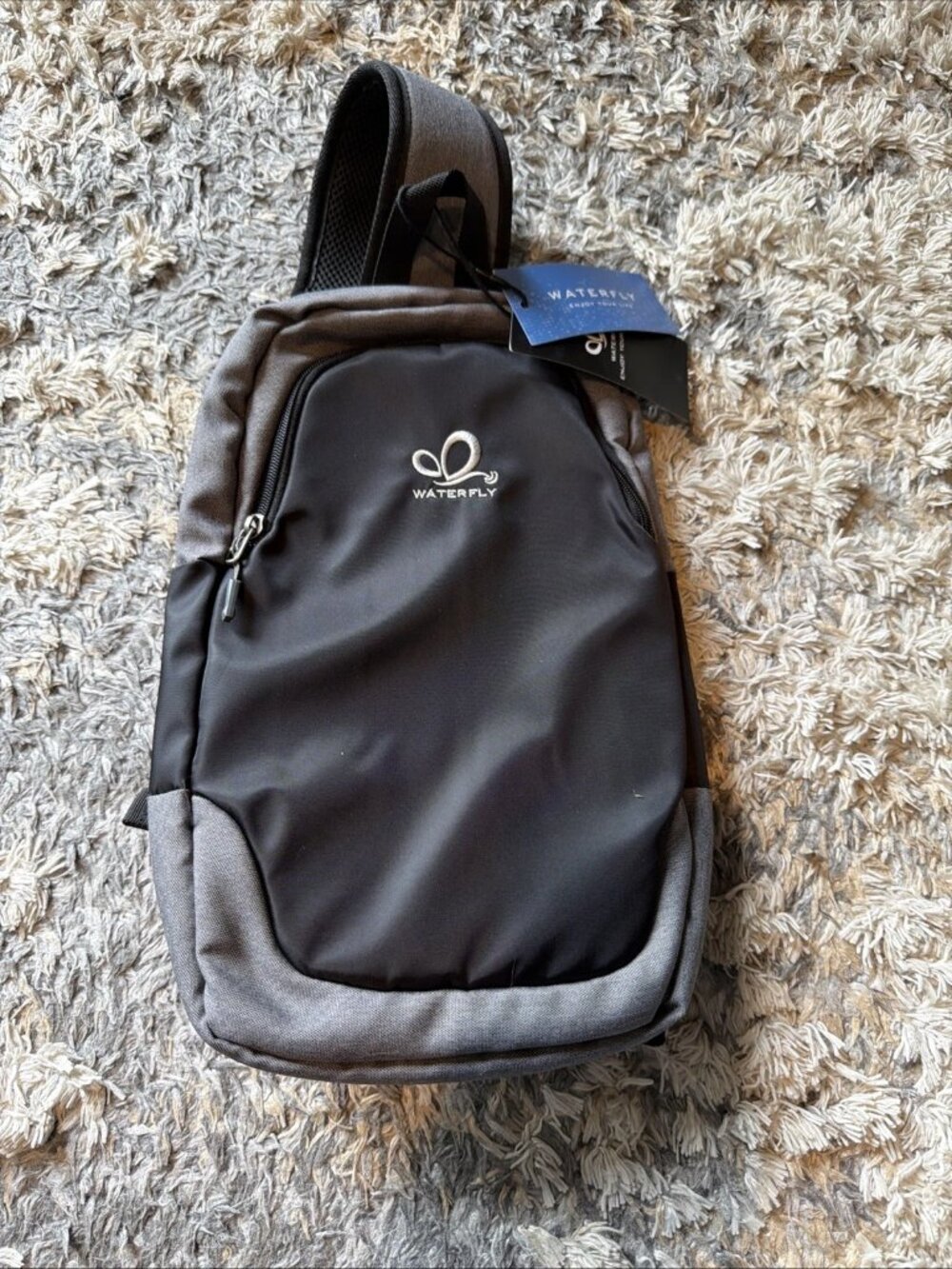 NWT WATERFLY Sling Backpack School Sport Bag Black & Gray